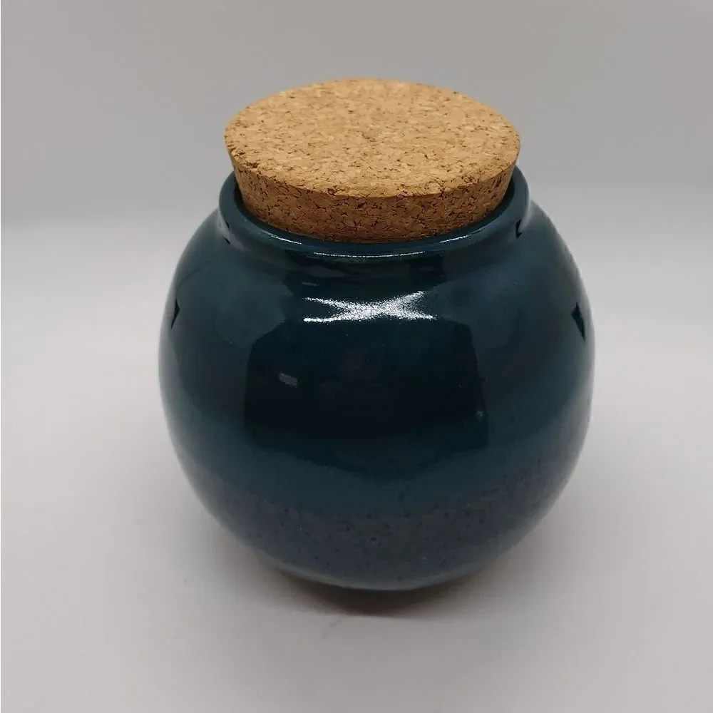 Cruise Finds Pottery Jar with Cork